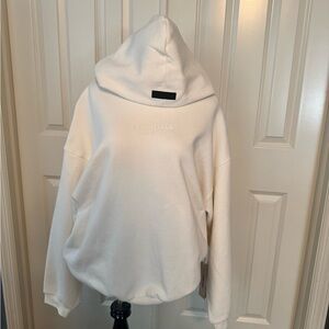 Essentials Cream Embossed Logo Pullover Hoodie